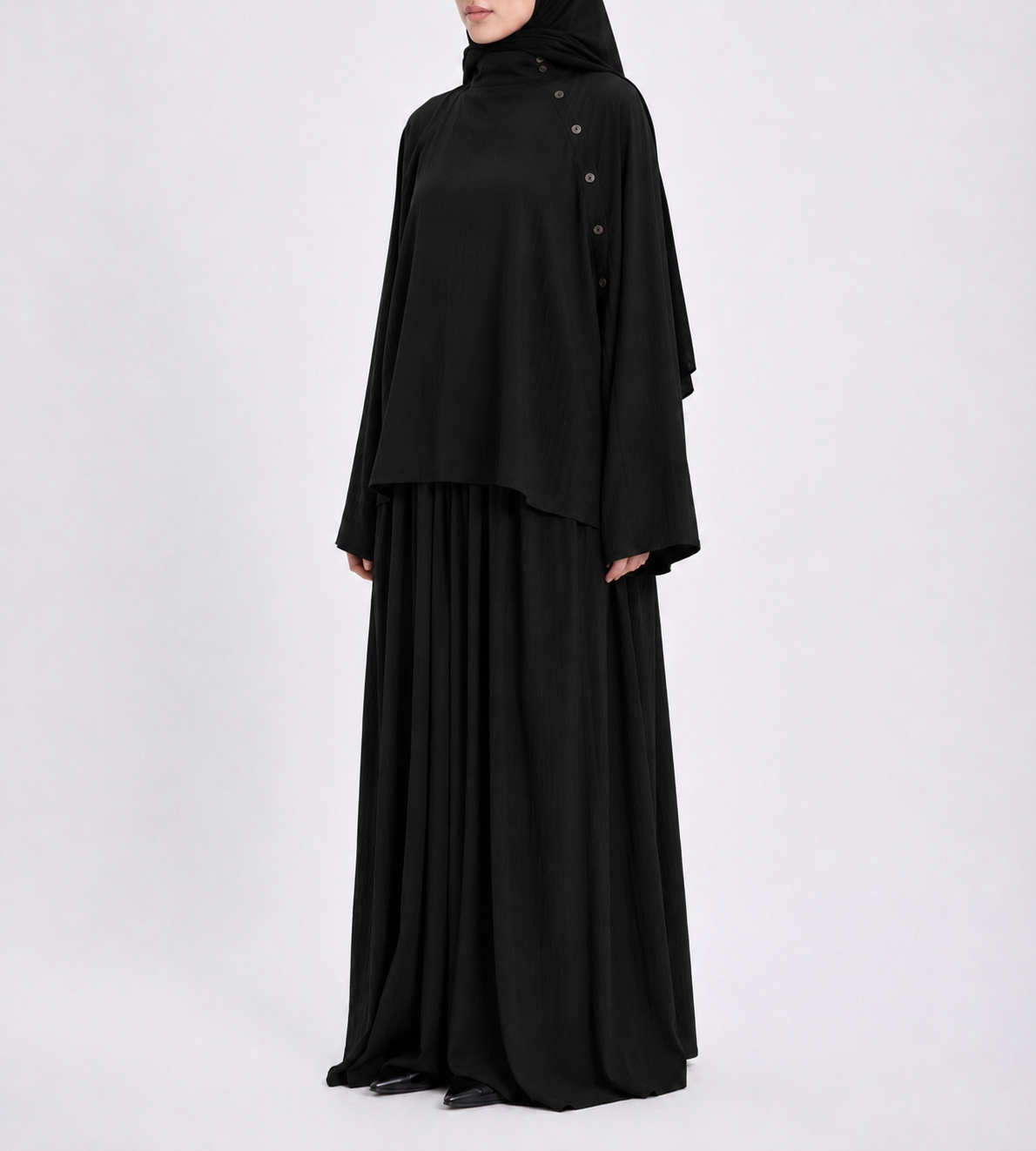 Top à bouton asymétrique noir
